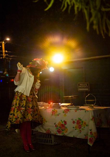 Rose Aster, played by Natalie Senecal, prepares tea for attendees during a dress rehearsal of & ...