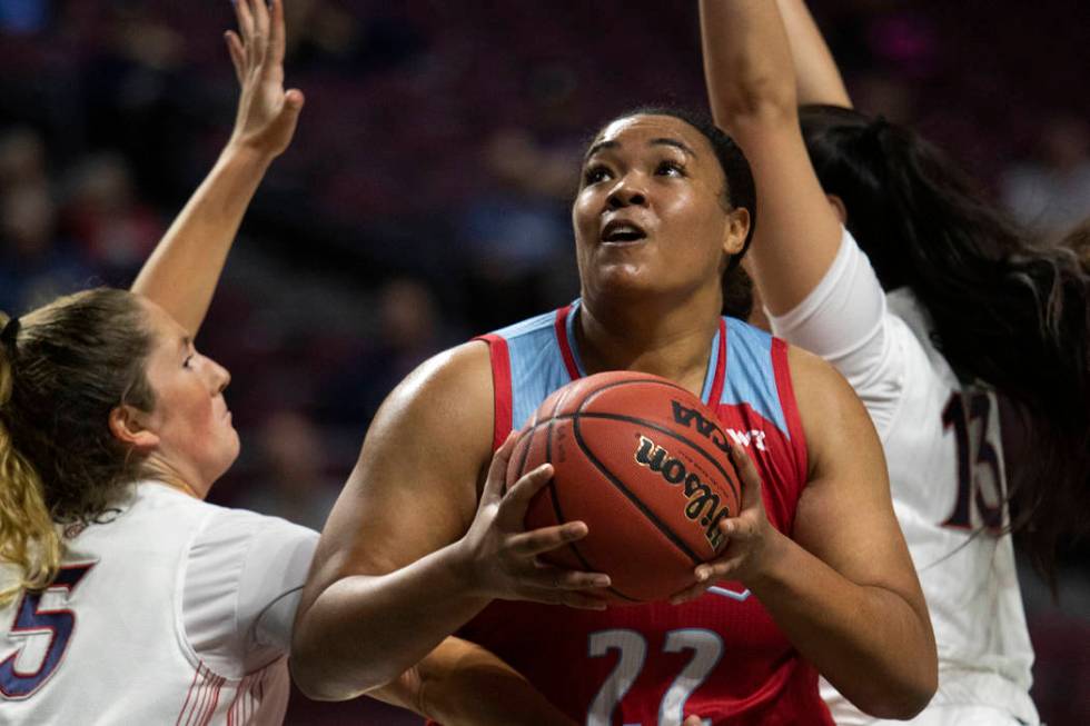 Loyola Marymount's center Raychel Stanley (22) attempts a point during the first round of the W ...