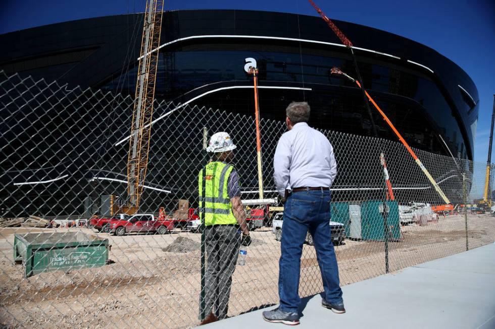 The sign gets installed at the Raiders Allegiant Stadium in Las Vegas, Thursday, March 5, 2020. ...