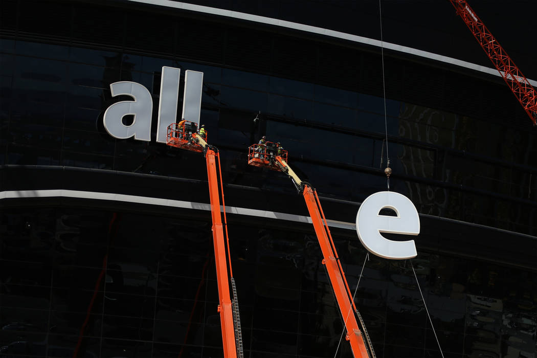 The signage of the Raiders Allegiant Stadium in Las Vegas is installed, Thursday, March 5, 2020 ...