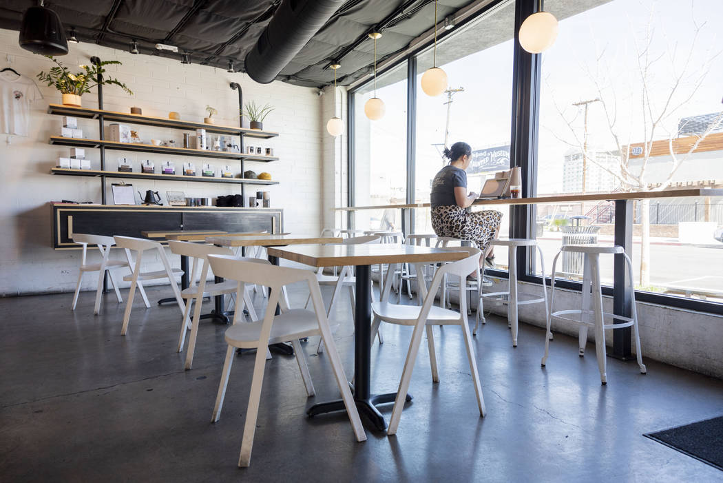 An individual works on their computer at Vesta Coffee Roasters in the Arts District in Las Vega ...