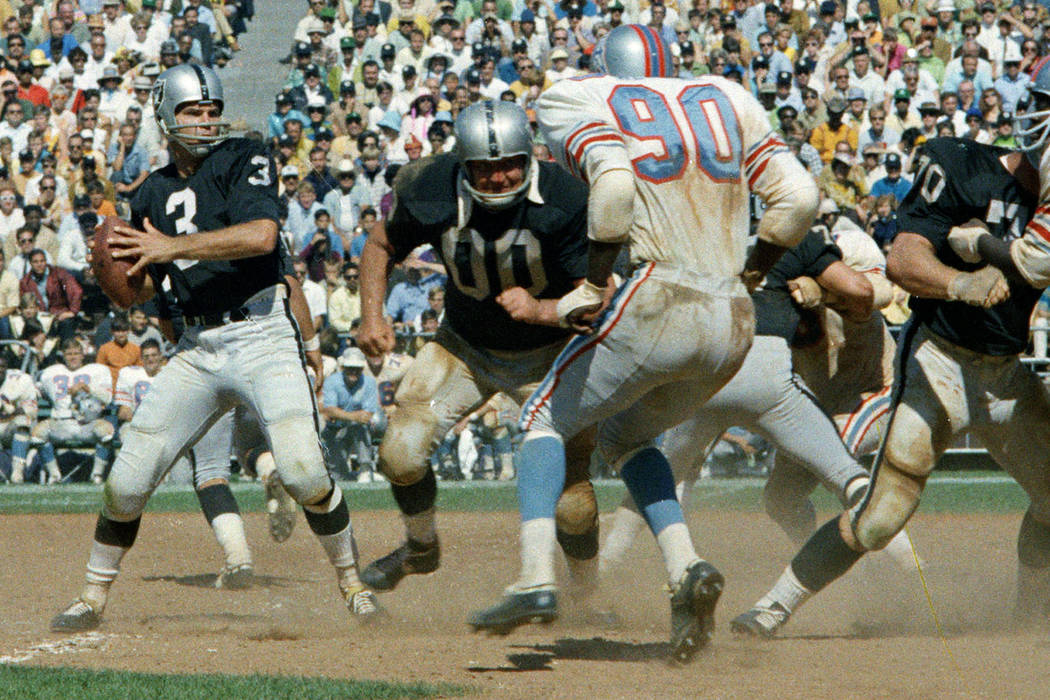 Oakland Raiders quarterback Daryle Lamonica is shown in a game against the Houston Oilers in 19 ...