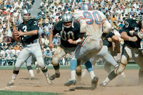 Oakland Raiders quarterback Daryle Lamonica is shown in a game against the Houston Oilers in 19 ...