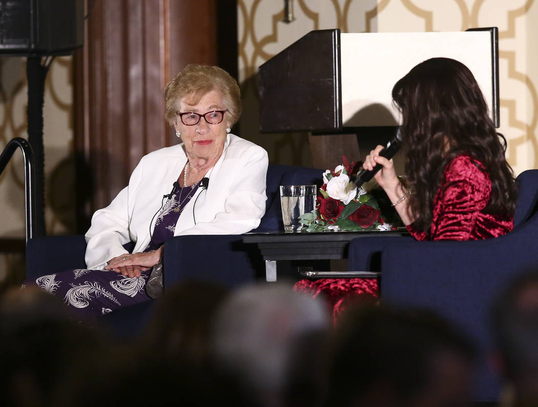 Eva Schloss, stepsister of Anne Frank, left, speaks with Binie Rivkin, co-director of Chabad of ...