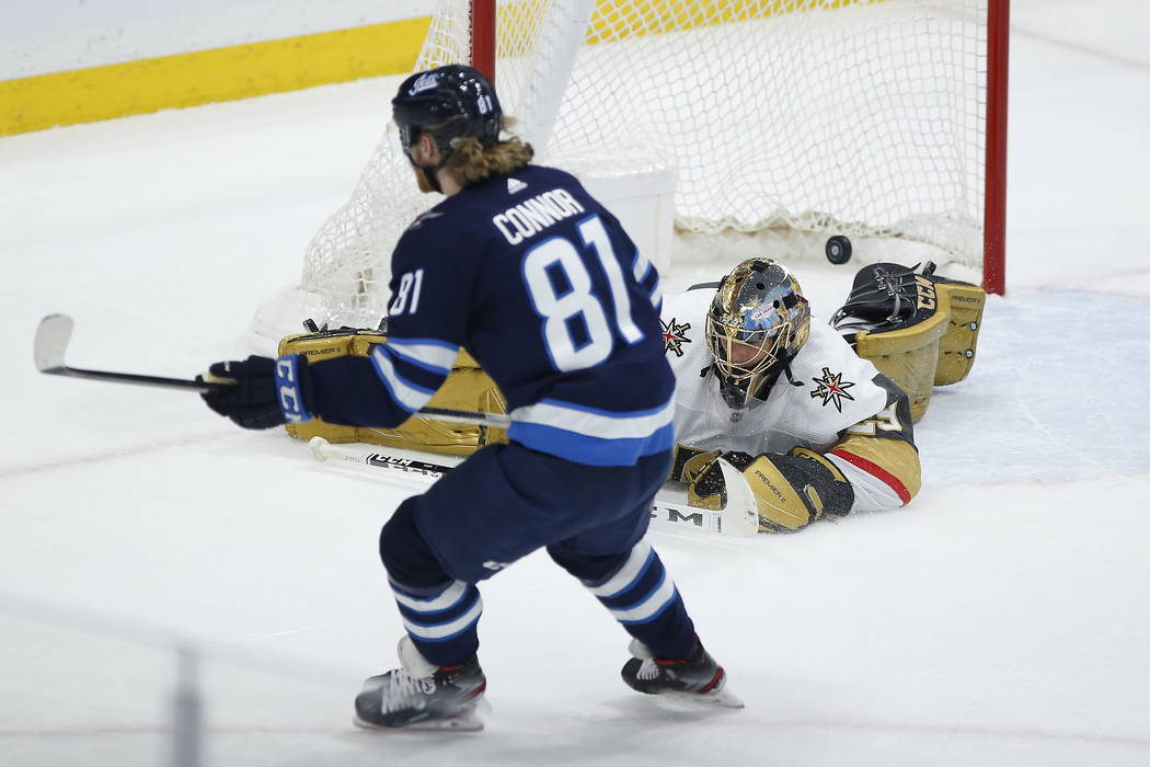 Winnipeg Jets' Kyle Connor (81) scores on Vegas Golden Knights goaltender Marc-Andre Fleury (29 ...