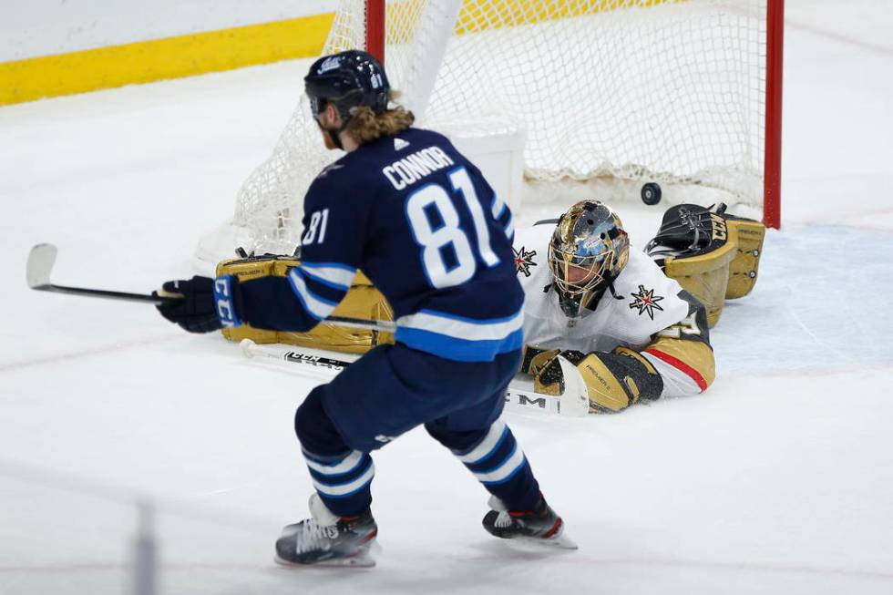 Winnipeg Jets' Kyle Connor (81) scores on Vegas Golden Knights goaltender Marc-Andre Fleury (29 ...