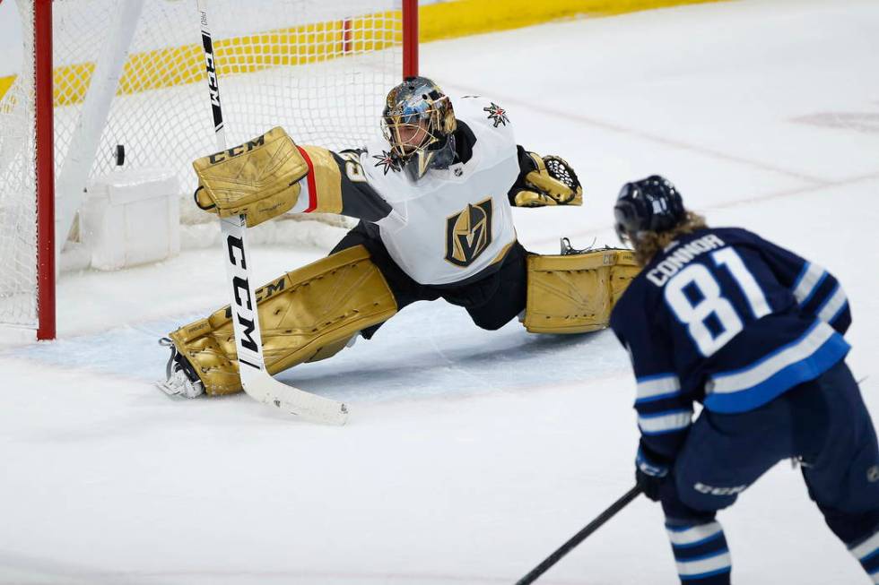 Winnipeg Jets' Kyle Connor (81) scores against Vegas Golden Knights goaltender Marc-Andre Fleur ...