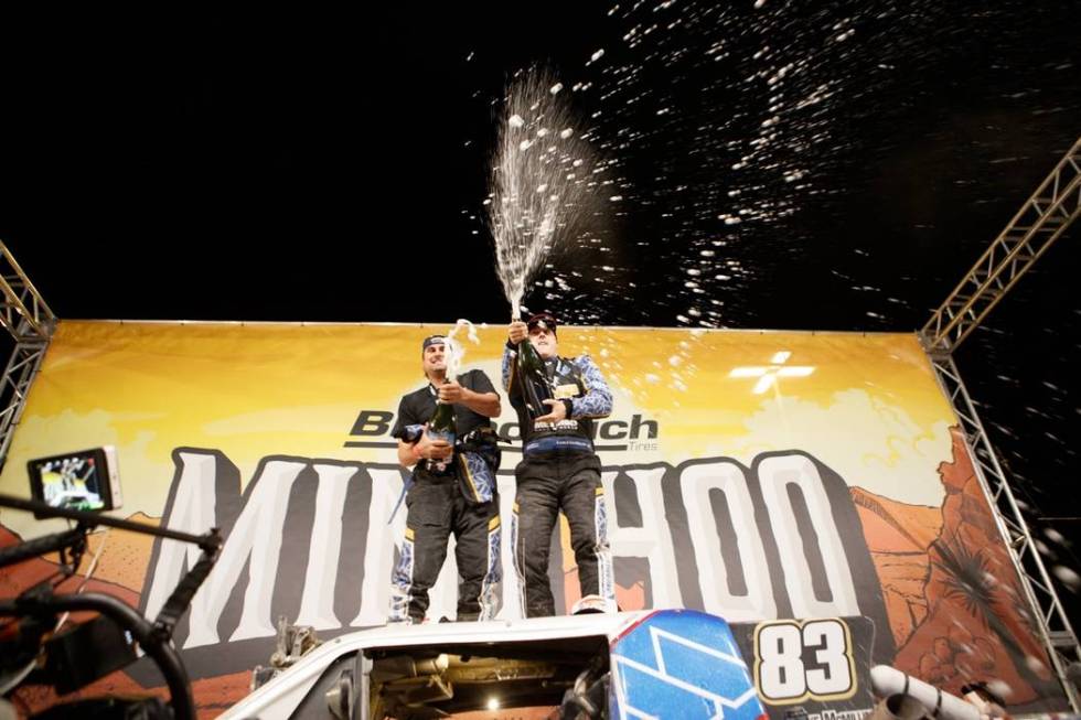 Luke McMillin, right, and co-driver Jason Duncan celebrate after winning the Mint 400 off-roar ...