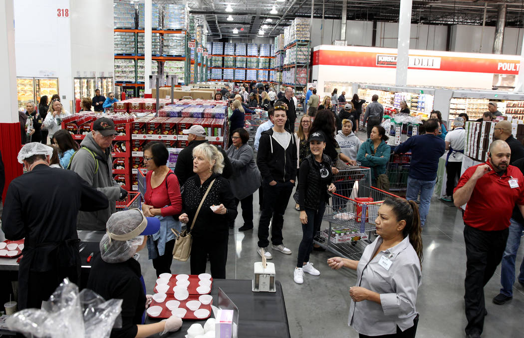 Shoppers at the grand opening of Costco near the intersection of St. Rose Parkway and Amigo Str ...