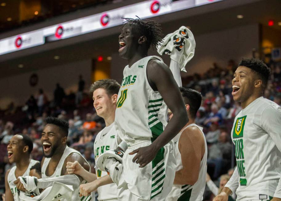 San Francisco Dons players celebrate after a big play in the second half during their West Coas ...