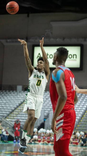 San Francisco Dons guard Khalil Shabazz (0) shoot a three point shot over Loyola Marymount Lion ...