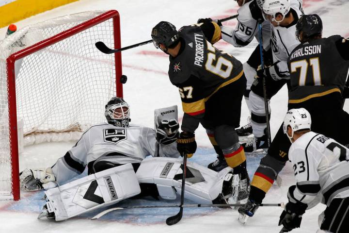 Los Angeles Kings goaltender Calvin Petersen (40) makes a save on a shot by Vegas Golden Knight ...