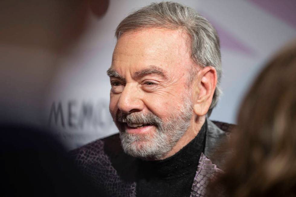 Neil Diamond talks with the media on the red carpet during the 24th Annual Power of Love Gala o ...