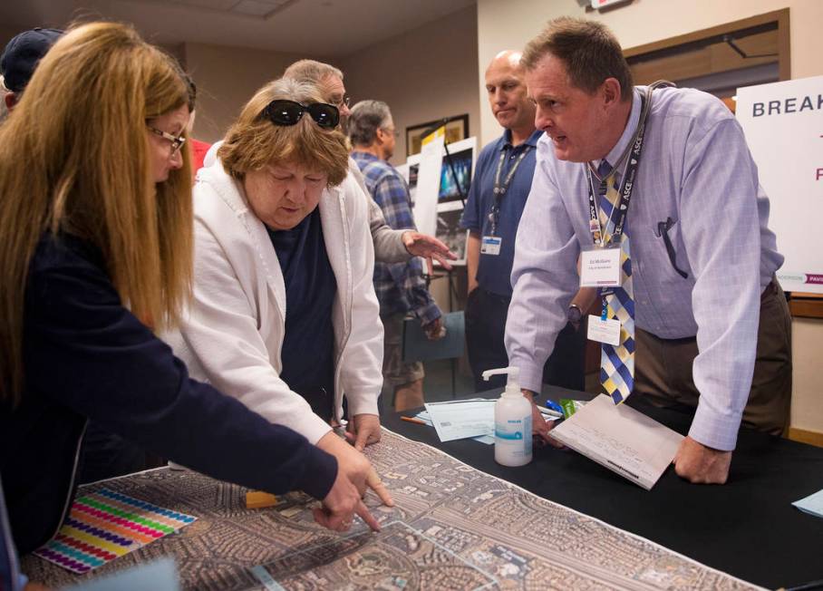 Public Works Director for the City of Henderson Ed McGuire answers questions for residents Bobb ...