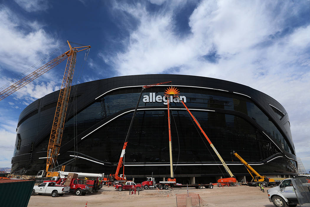 The signage is installed at the Raiders Allegiant Stadium in Las Vegas, Saturday, March 7, 2020 ...