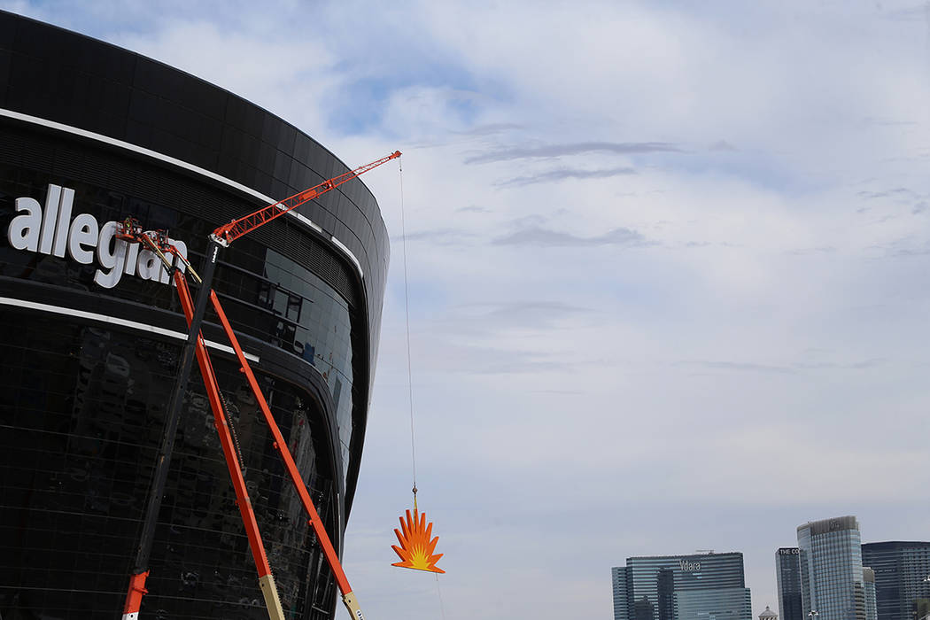 The signage is installed at the Raiders Allegiant Stadium in Las Vegas, Saturday, March 7, 2020 ...