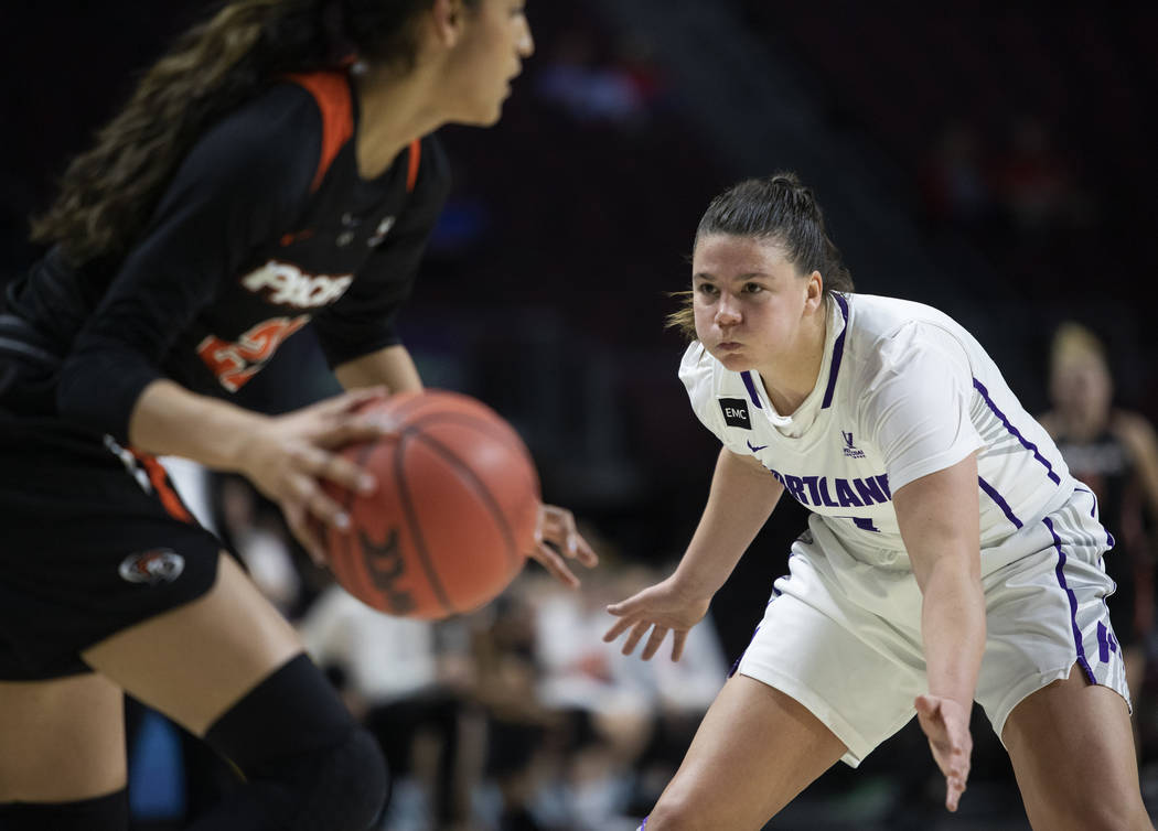 University of Portland's guard Kate Andersen (1) blocks as University of the Pacific's guard Ka ...