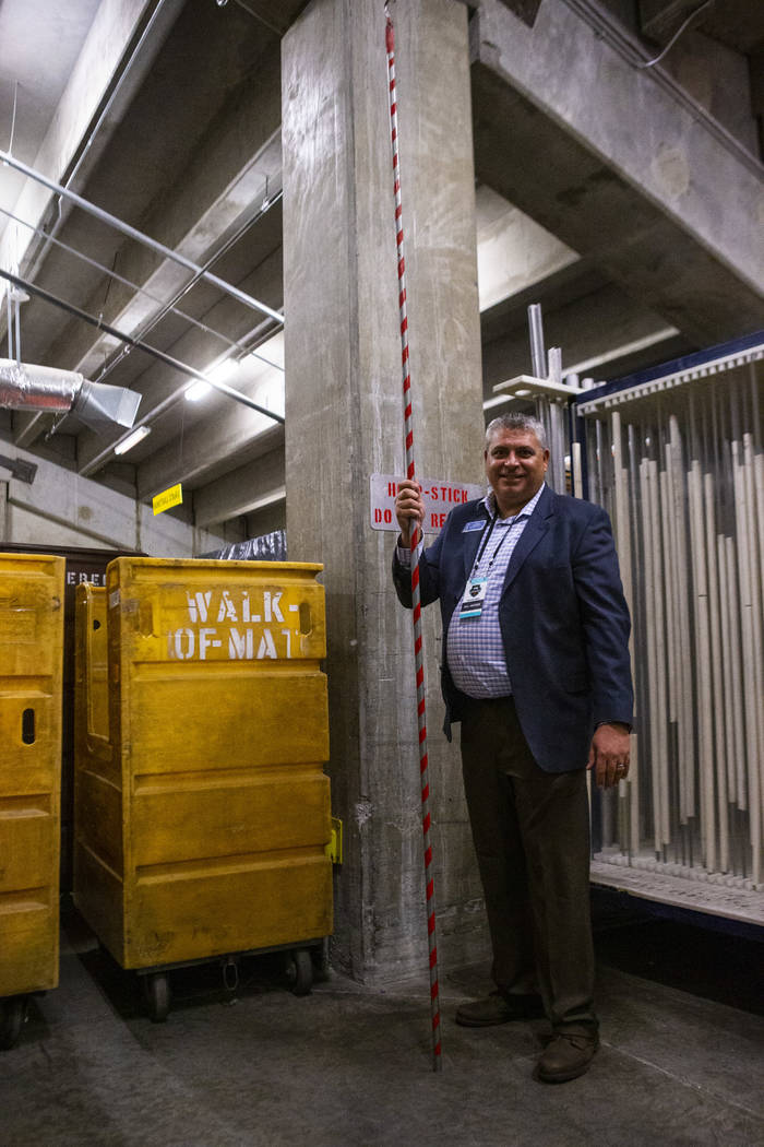Rex Berman, Director of Arena Operations at Orleans Arena, holds the hoop stick during West Coa ...