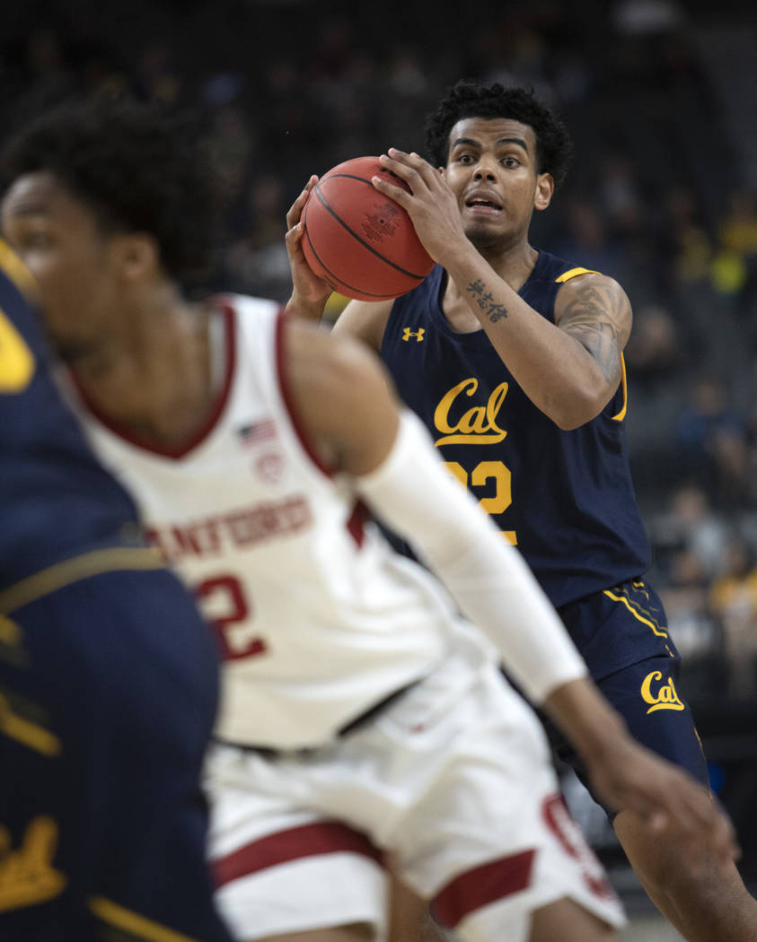 University of California, Berkely's forward Andre Kelly (22) looks to pass the ball during the ...