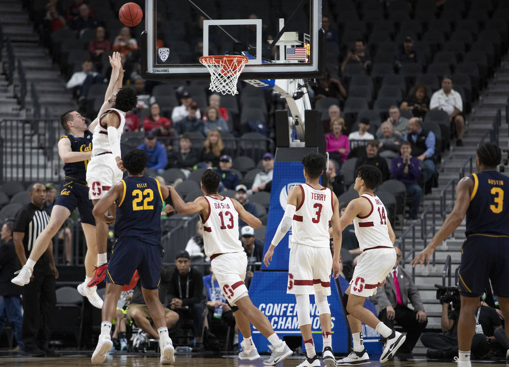 Stanford's guard Bryce Wills (2) blocks a point by California's forward Grant Anticevich (15) d ...