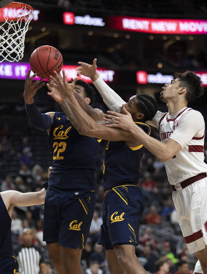 Stanford's forward Jaiden Delaire (11) attempts a point as California's forward Andre Kelly (22 ...