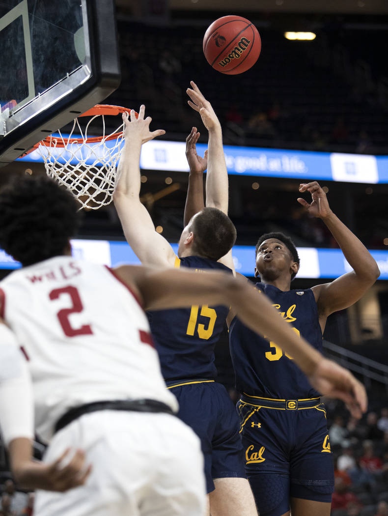 California's forward D.J. Thorpe (33) jumps to block a Stanford point during the game against S ...