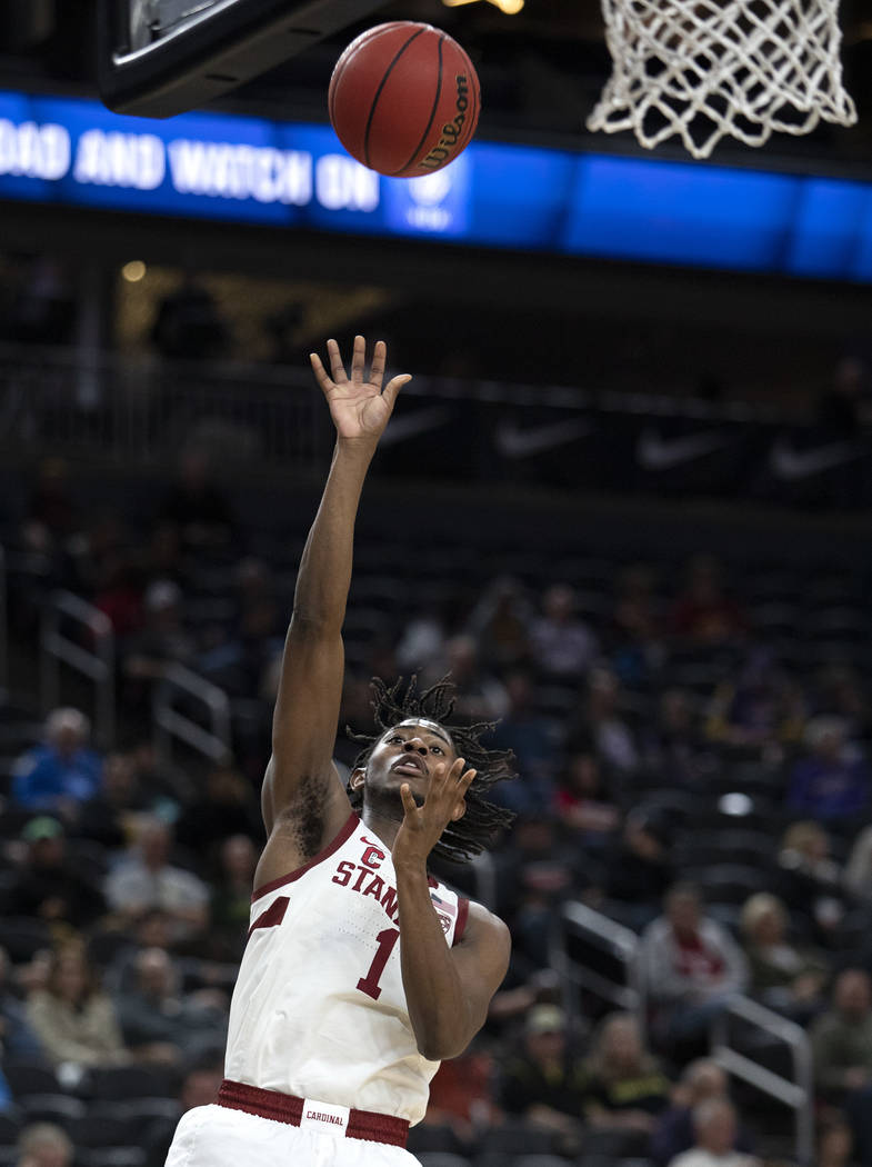 Stanford's guard Daejon Davis (1) attempts a point during the Pac-12 tournament at T-Mobile Are ...