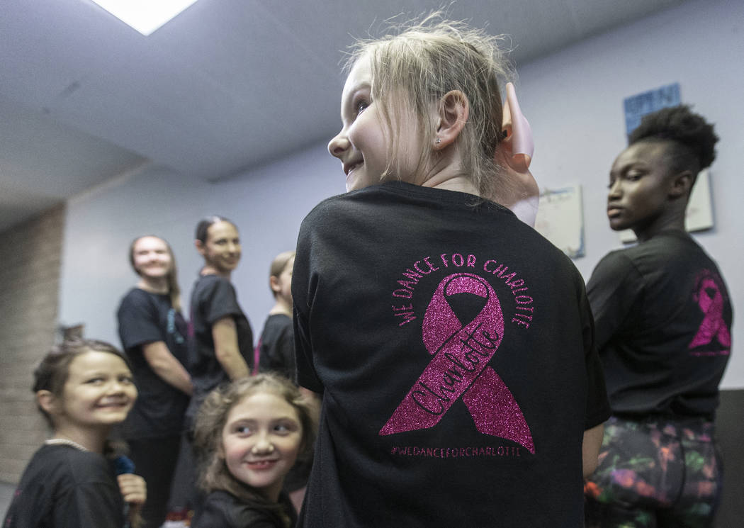 Alli Kano, second from left, practices at Scoil Rince Ni Riada Irish Dance on Wednesday, March ...