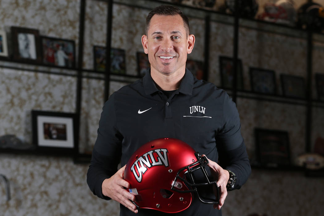 UNLV football head coach Marcus Arroyo is photographed in his office at the Fertitta Football C ...