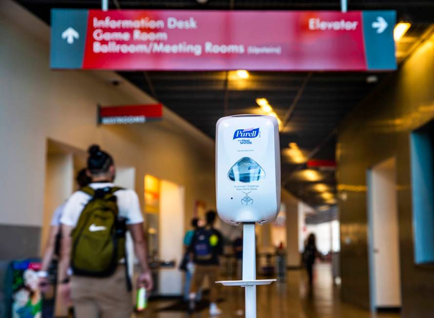 A hand sanitizer dispenser is installed for use at the entrance to the UNLV Student Union build ...