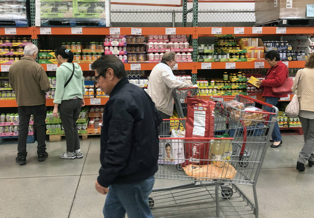 Customers shop medicines at Costco in Henderson on Monday, March 2, 2020. People are stocking u ...