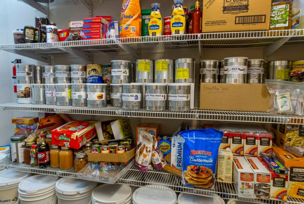 Some of the many food items stored in the home pantry of Cory and Holly Steed on Monday, March ...