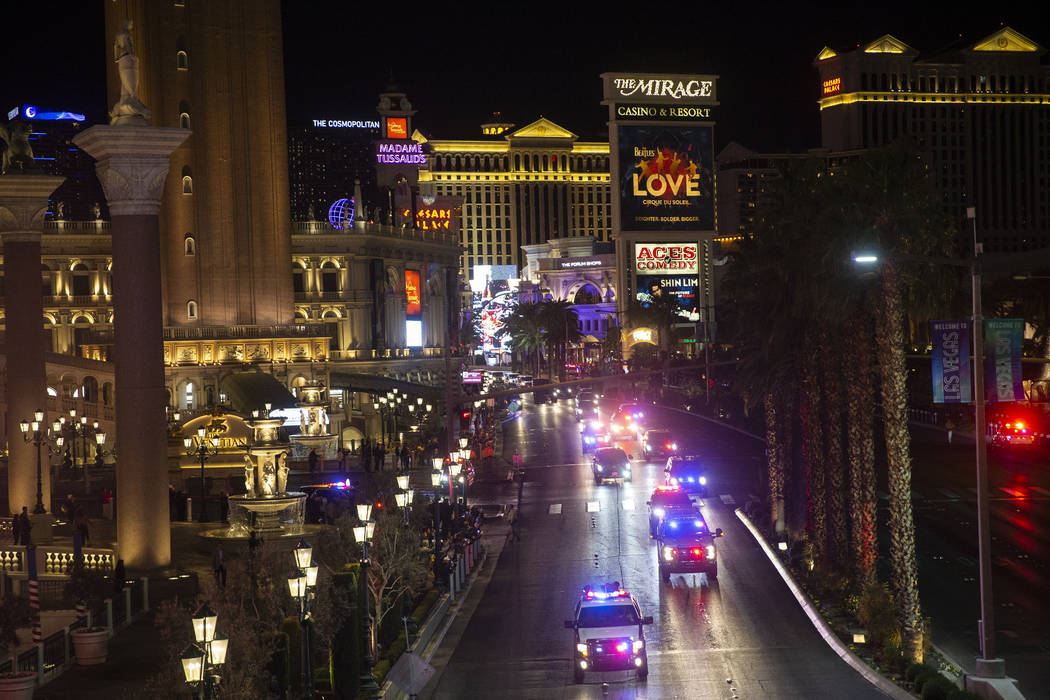 President Donald Trump's motorcade drives north on the Las Vegas Strip outside The Venetian wit ...