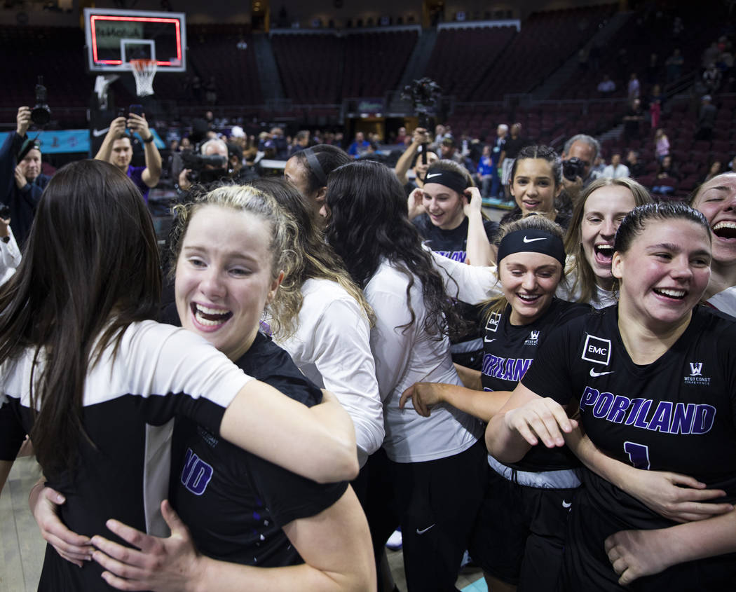 The Portland Pilots celebrate after winning the West Coast Conference championship against the ...