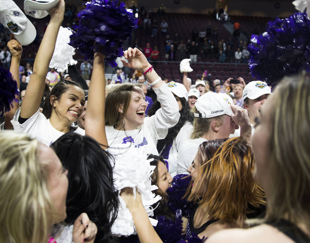 The Portland Pilots celebrate after winning the West Coast Conference championship against the ...