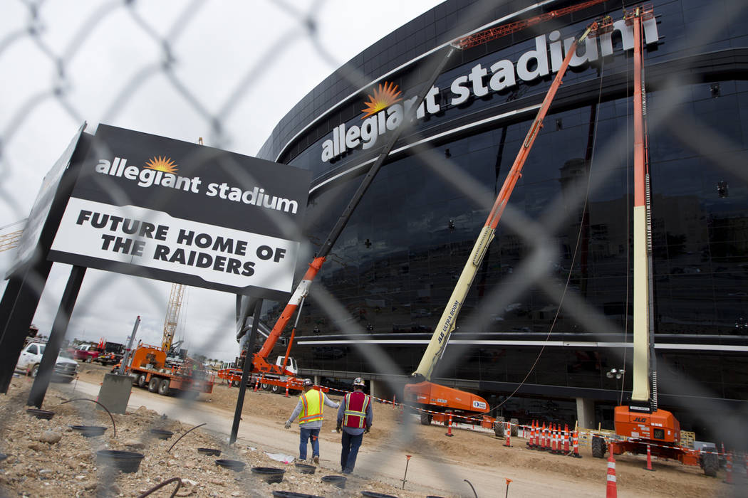 Signage is installed at the Raiders Allegiant Stadium in Las Vegas, Tuesday, March 10, 2020. (E ...