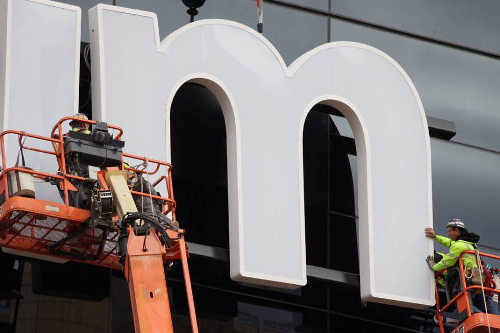 The last letter in the signage for the Raiders Allegiant Stadium logo is installed, in Las Vega ...