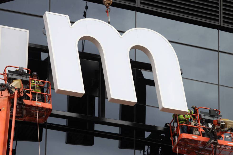 The last letter in the signage for the Raiders Allegiant Stadium logo is installed, in Las Vega ...