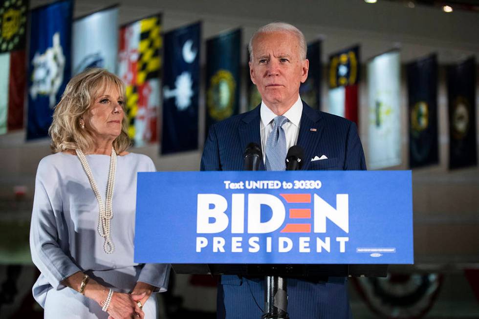 Democratic presidential candidate former Vice President Joe Biden, accompanied by his wife Jill ...