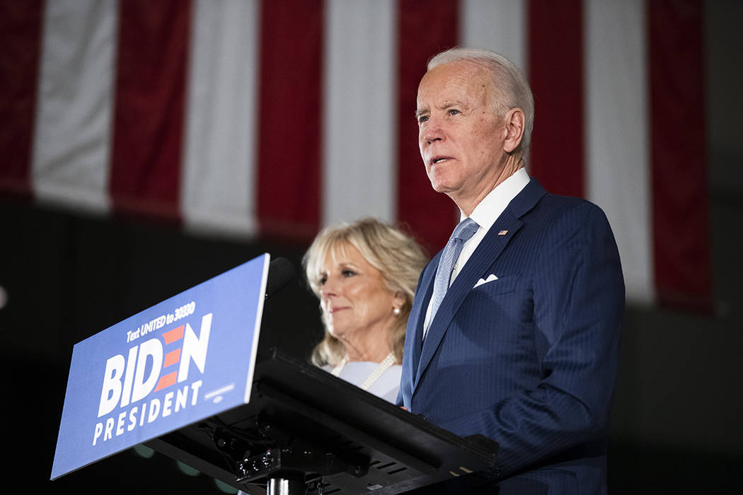 Democratic presidential candidate former Vice President Joe Biden, accompanied by his wife Jill ...