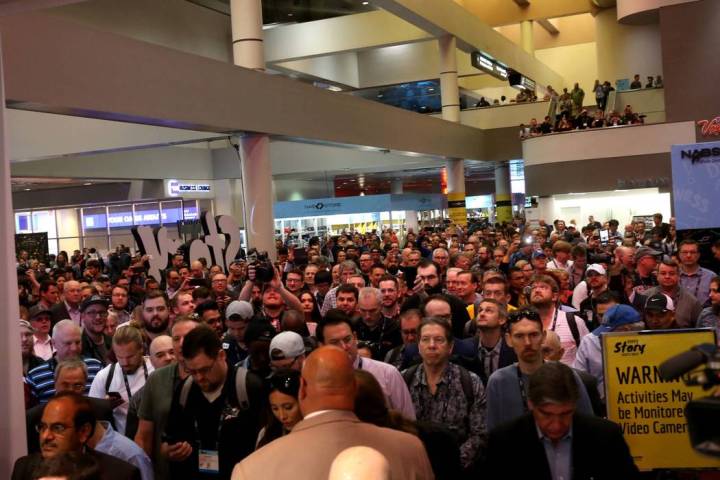 Conventioneers pour onto the show floor on the opening day of the National Association of Broad ...