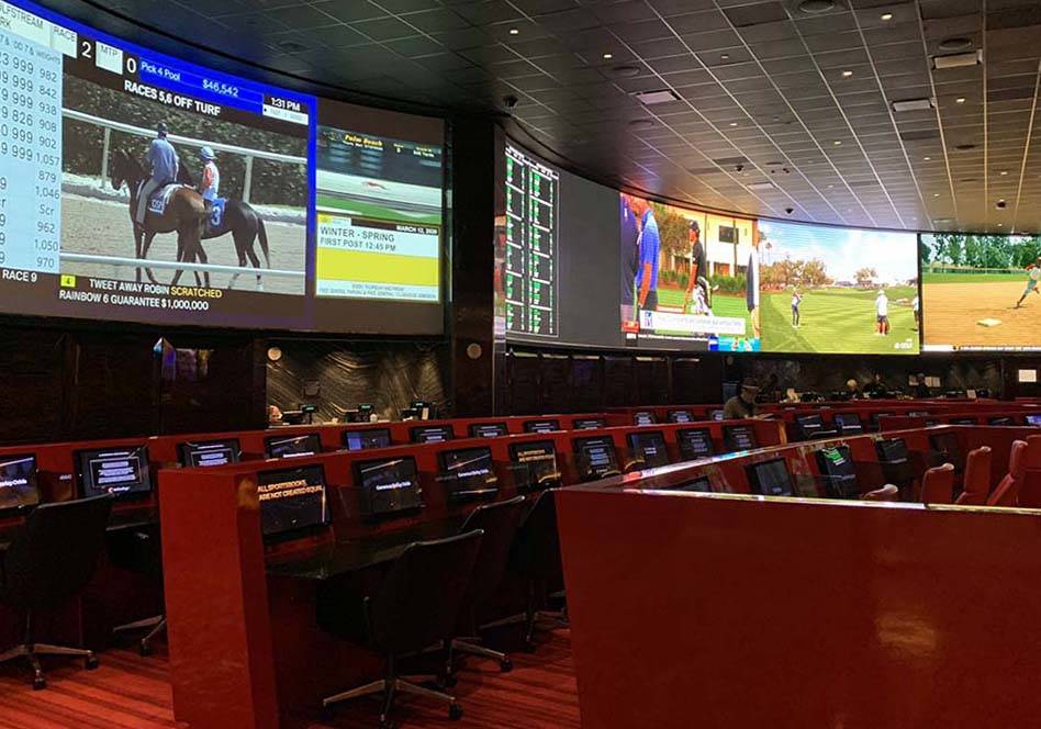 Sports book at The Venetian on the Las Vegas Strip was mostly empty on Thursday, March 12, 2020 ...