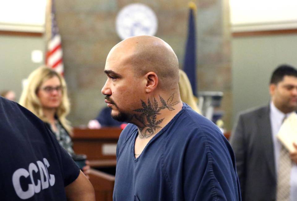 Christopher Weygant enters the courtroom during his sentencing at the Regional Justice Center o ...