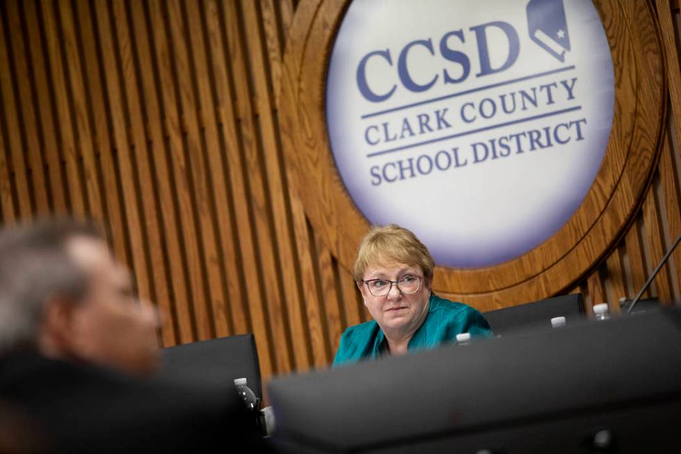 Clark County School District Board of Trustees member Chris Garvey, District B, listens as a me ...