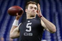 Georgia quarterback Jake Fromm runs a drill at the NFL football scouting combine in Indianapoli ...