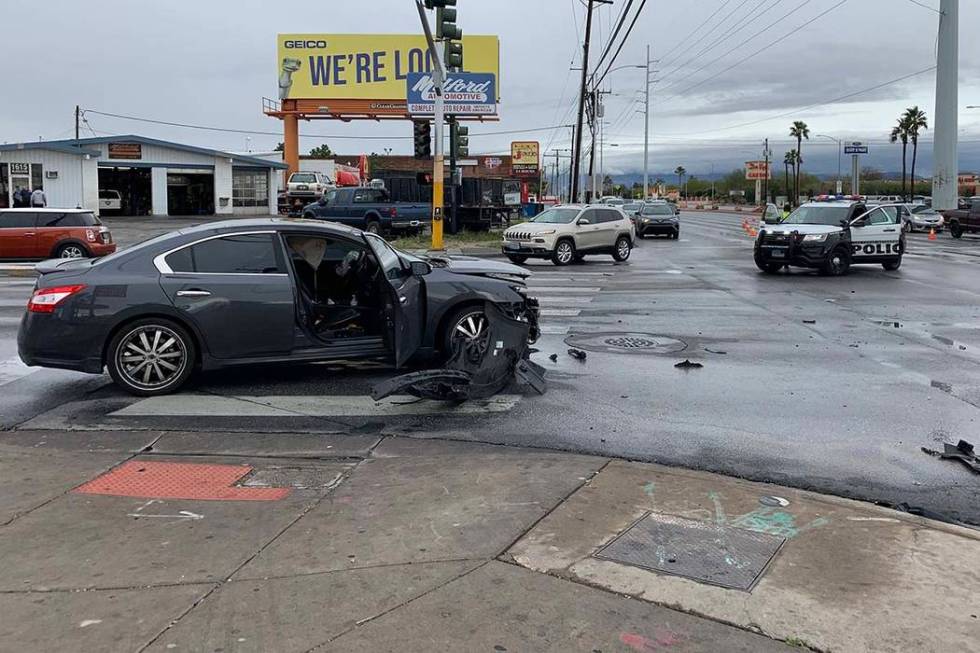 A man who police say fled from officers in central Las Vegas crashed his vehicle at the interse ...