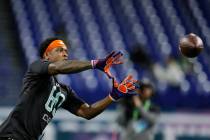Clemson defensive back K'Von Wallace runs a drill at the NFL football scouting combine in India ...