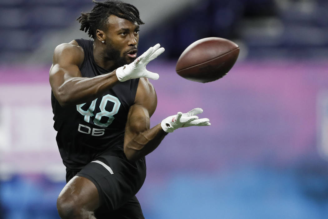 Ohio State defensive back Jordan Fuller runs a drill at the NFL football scouting combine in In ...