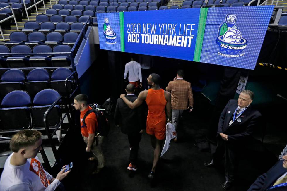 Clemson players leave the floor after the NCAA college basketball games at the Atlantic Coast C ...