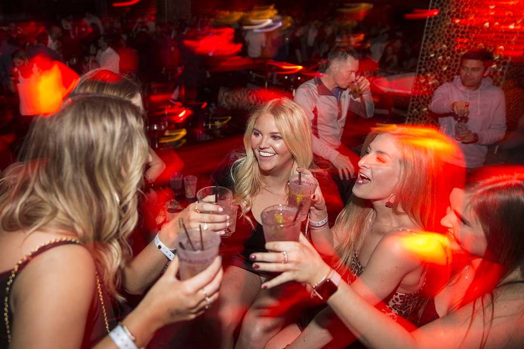 Clubgoers socialize at Tao Las Vegas at The Grand Canal Shoppes in Las Vegas, Jan. 31, 2019. (B ...